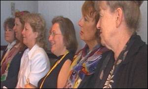 Women listening to how they could make an impression