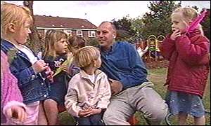 Rob talks to children at Smarties nursery