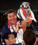 Roger Lemerre lifts the European Championship trophy
