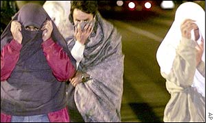 Asylum seekers trying to enter the Channel Tunnel in France