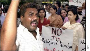 A man protests against the attacks