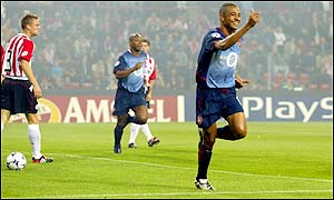 Silva turns away in delight after scoring the fastest goal in Champions League history