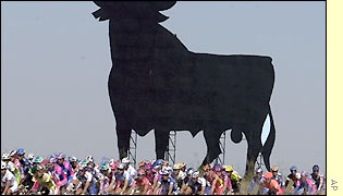 An image of a bull dominates the skyline during an early part of the race