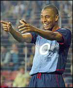 Arsenal's Gilberto Silva celebrates his goal against PSV