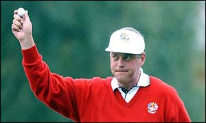 Darren Clarke saultes the crowd after winning a hole for Europe