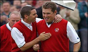 Sergio Garcia and Lee Westwood celebrate victory and Europe's first point