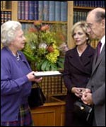 The Queen with Alan Greenspan and wife Andrea Mitchell