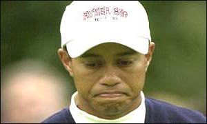 Tiger Woods looks disappointed with himself as he suffers a second defeat