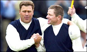 Hal Sutton and Scott Verplank congratulate each other on a job well done after coming from behind to beat Clarke and Bjorn 2&1