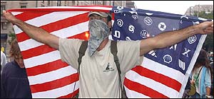 Protester waves a flag in downtown Washington