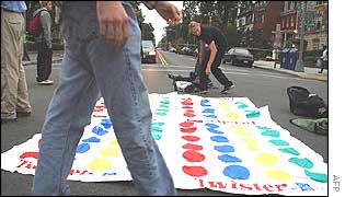 Twister game being set up at an iintersection