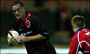 Martin Leslie on his way to scoring for Edinburgh