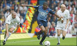 Kanu breaking forward for Arsenal during their 4-1 win at Leeds