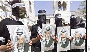 Hooded militiamen with the Al Aqsa Martyrs Brigades hold demonstration