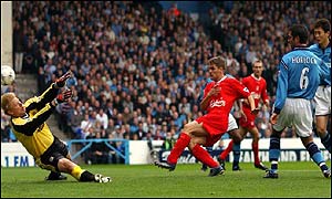 Michael Owen punishes poor defending with a clinical finish past Peter Schmeichel
