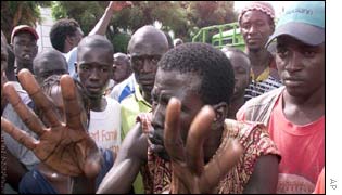 Relatives waiting for news at a Dakar port