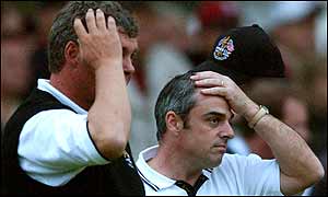 An exhausted Clarke and McGinley at the end of a stoiic display 