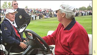Former US president George Bush stops to talk to US captain Curtis Strange