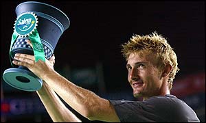 Juan Carlos Ferrero holds up the Salem Open trophy