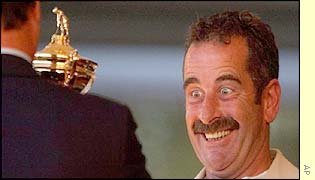 Sam Torrance's eyes bulge as he recieves the Ryder Cup 