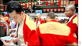A trader reading a Bible in a Sao Paulo session