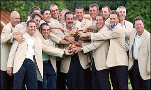 The European team regroup for a photo as they show off the Ryder Cuip trophy