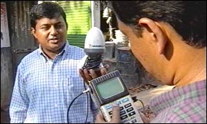 Engineer using GPS device