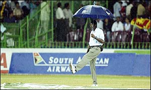 Heavy rain stops play for the second time and again the match is abandoned