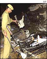 Policeman at site of mine blast