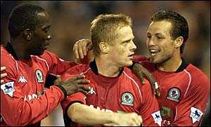 Damien Duff is congratulated by team-mates after scoring Rovers' second goal