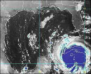 Hurricane Lili is seen over Cuba in shortwave infra red satellite image released by NOAA