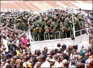 Thousands of Congolese line the streets of Bukavu to see the Rwandan troops pull out from South Kivu province.
