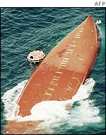 The upturned hull of the Joola