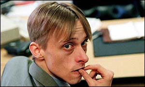 A worried looking office manager