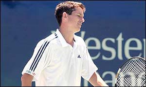 Tim Henman grimaces