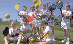 Children play mini-tennis
