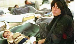 An Iraqi Kurdish mother with her child in a refugee camp in Iran