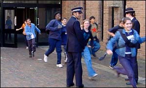 pupils leaving Stoke Newington School - Media Arts College with police present
