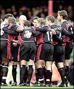 Southampton players go into their pre-match huddle