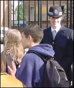 pupils leaving Stoke Newington School - Media Arts College with police present