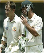 Langer and Ponting return to the pavilion 