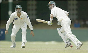 Damien Martyn scores a four on the way to his 10th Test half century