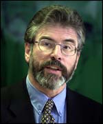Gerry Adams: Complaint to government over raids