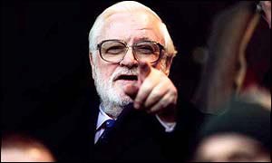 Ken Bates points at the camera