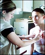 Chantelle (Annemarie Fulton) tends to Liam (Martin Compston)