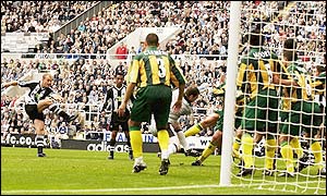 Newcastle skipper Alan Shearer fires home from six yards after Nolberto Solano lays the ball off to him from a free-kick inside the area.