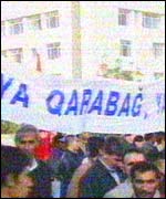Protesters with a banner