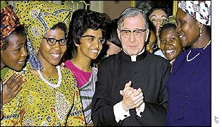 Jose Maria Escriva de Balaguer with unidentified African and Asian women in 1971