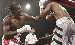 Audley Harrison batters the hapless Wade Lewis