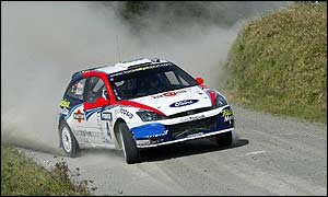 Ford's Carlos Sainz finished fourth despite sustaining suspension damage on stage 24